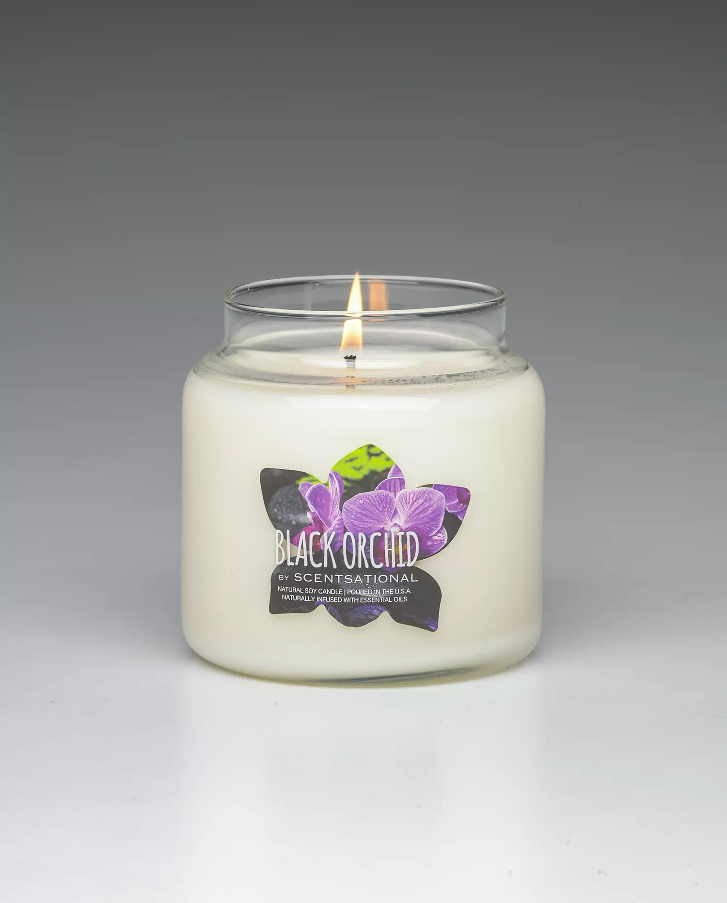 Black Orchid 19oz scented candle burning