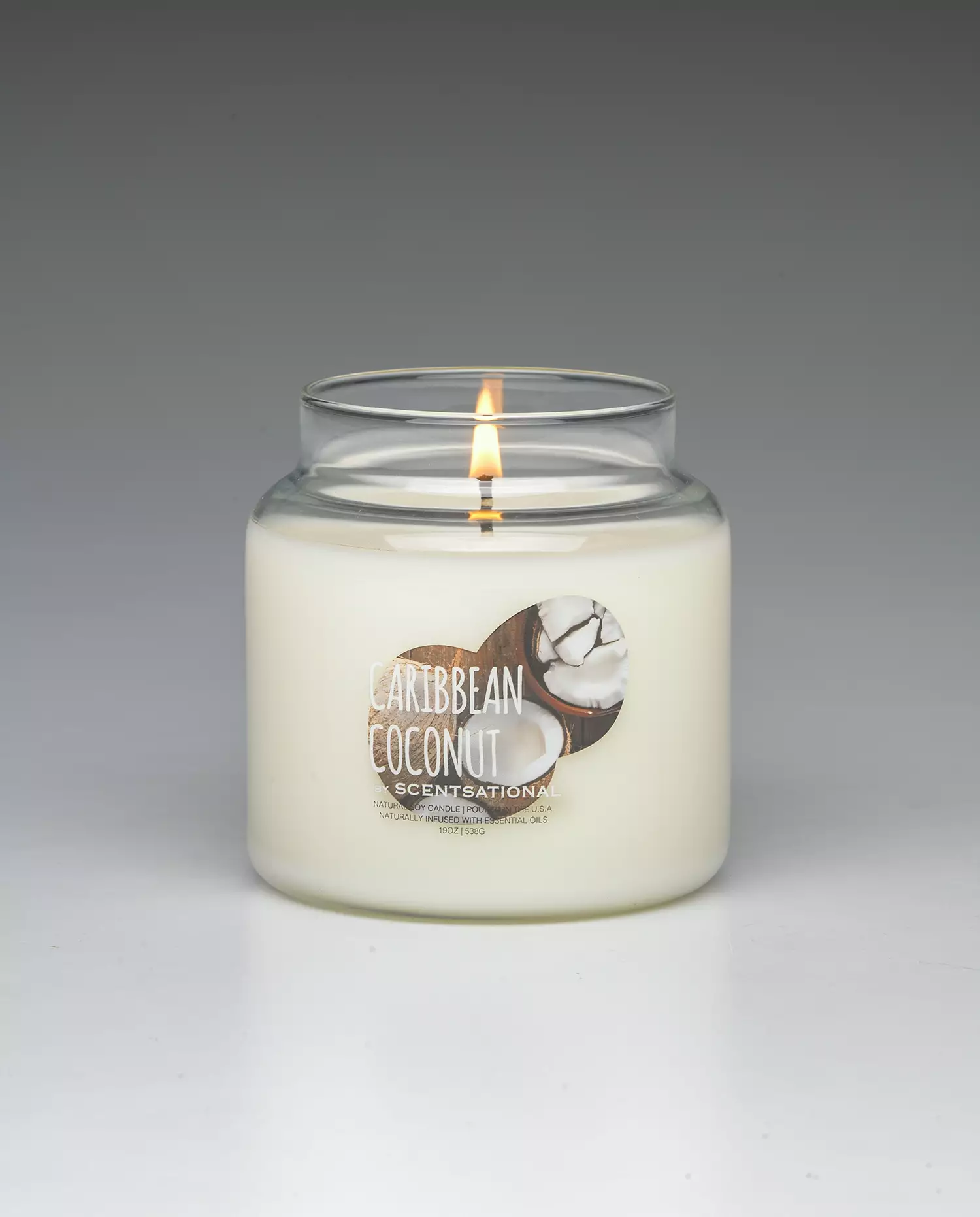 Caribbean Coconut 19oz scented candle burning