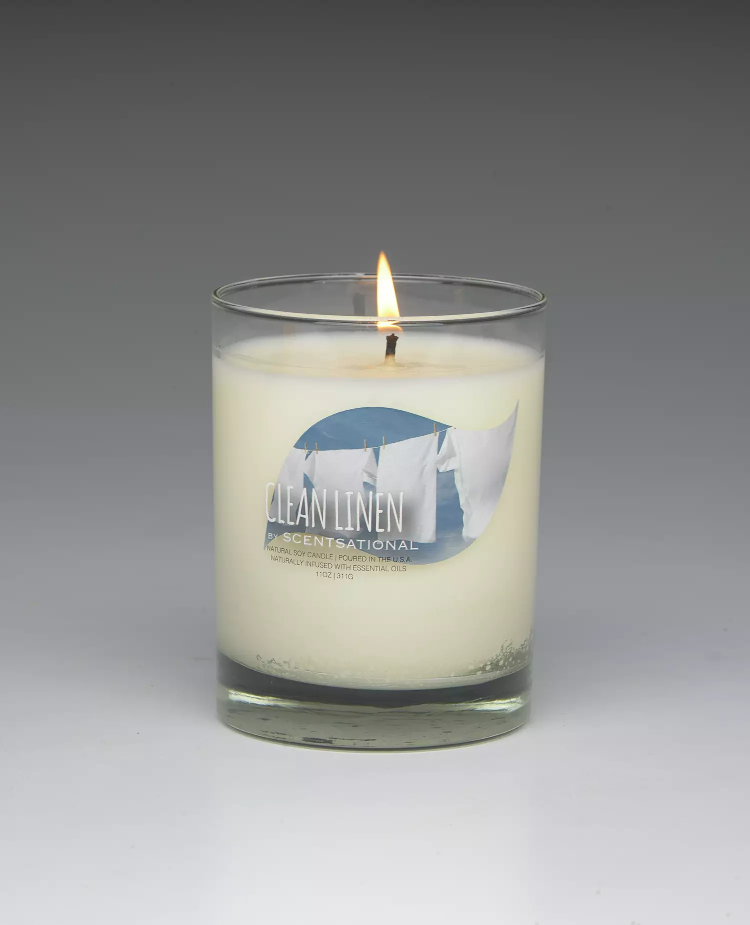 Clean Linen – 11oz scented candle burning