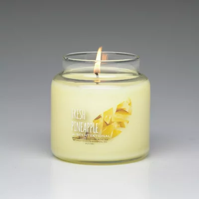 Fresh Pineapple 19oz scented candle burning