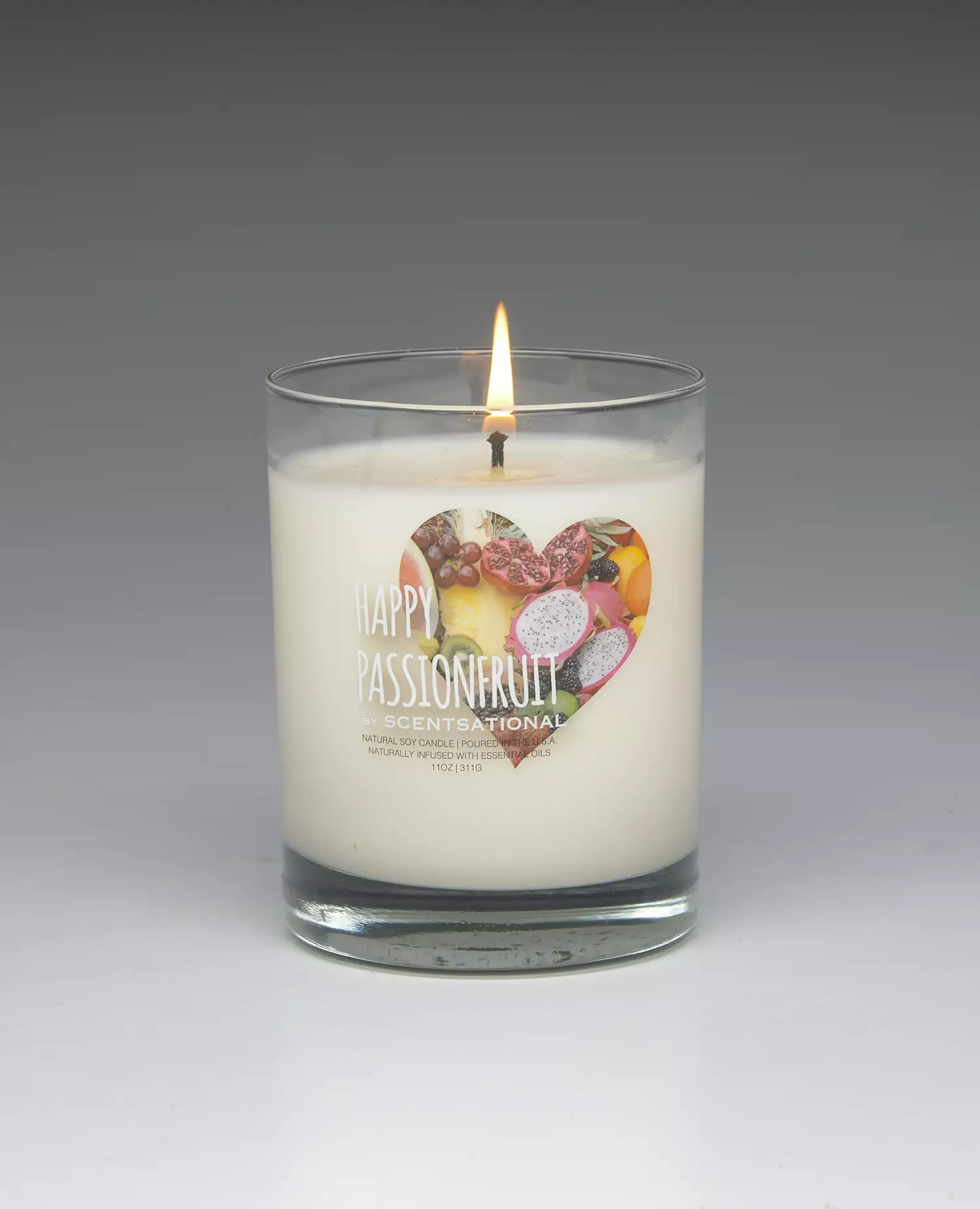 Happy Passionfruit – 11oz scented candle burning
