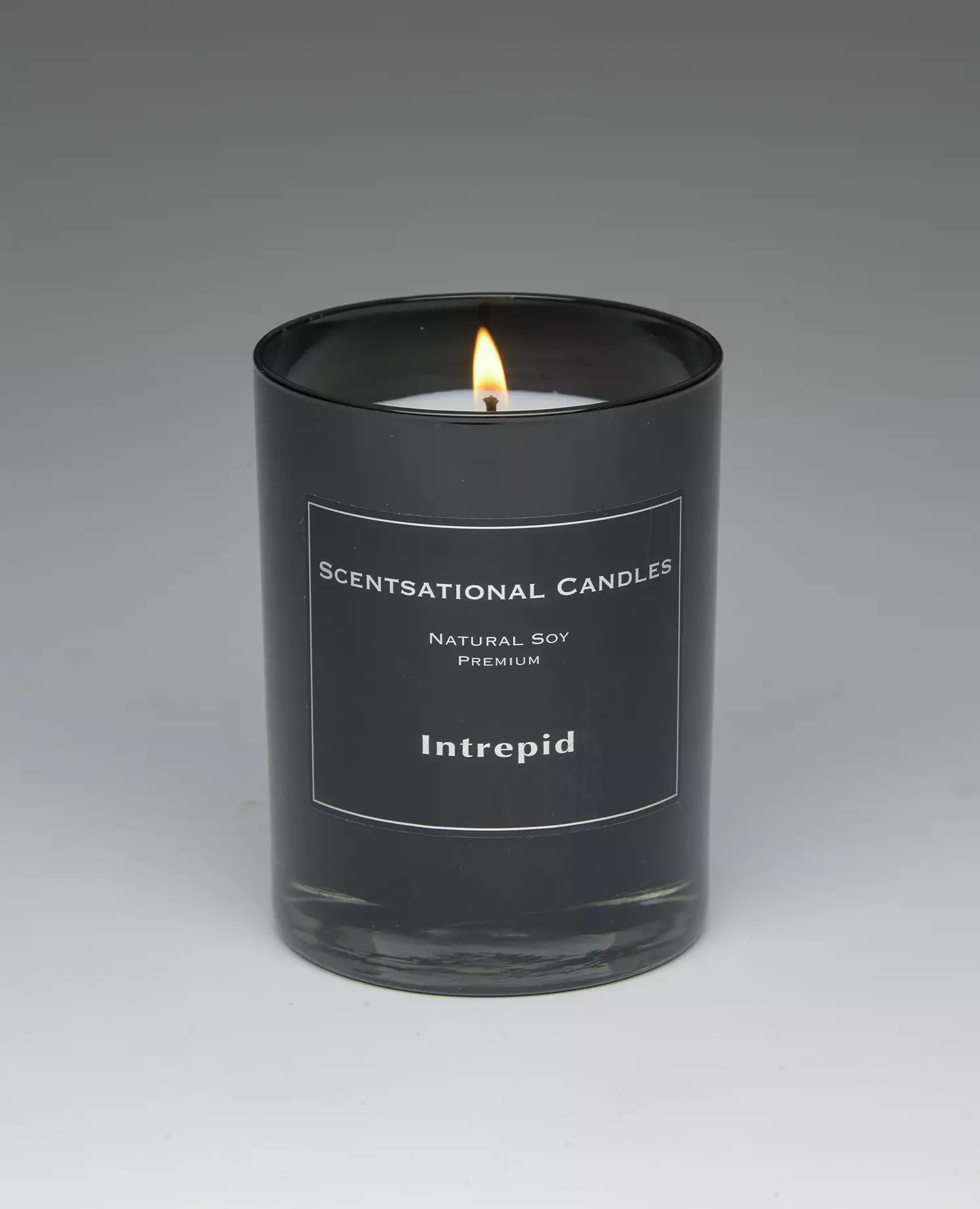 Intrepid – 11oz scented candle burning