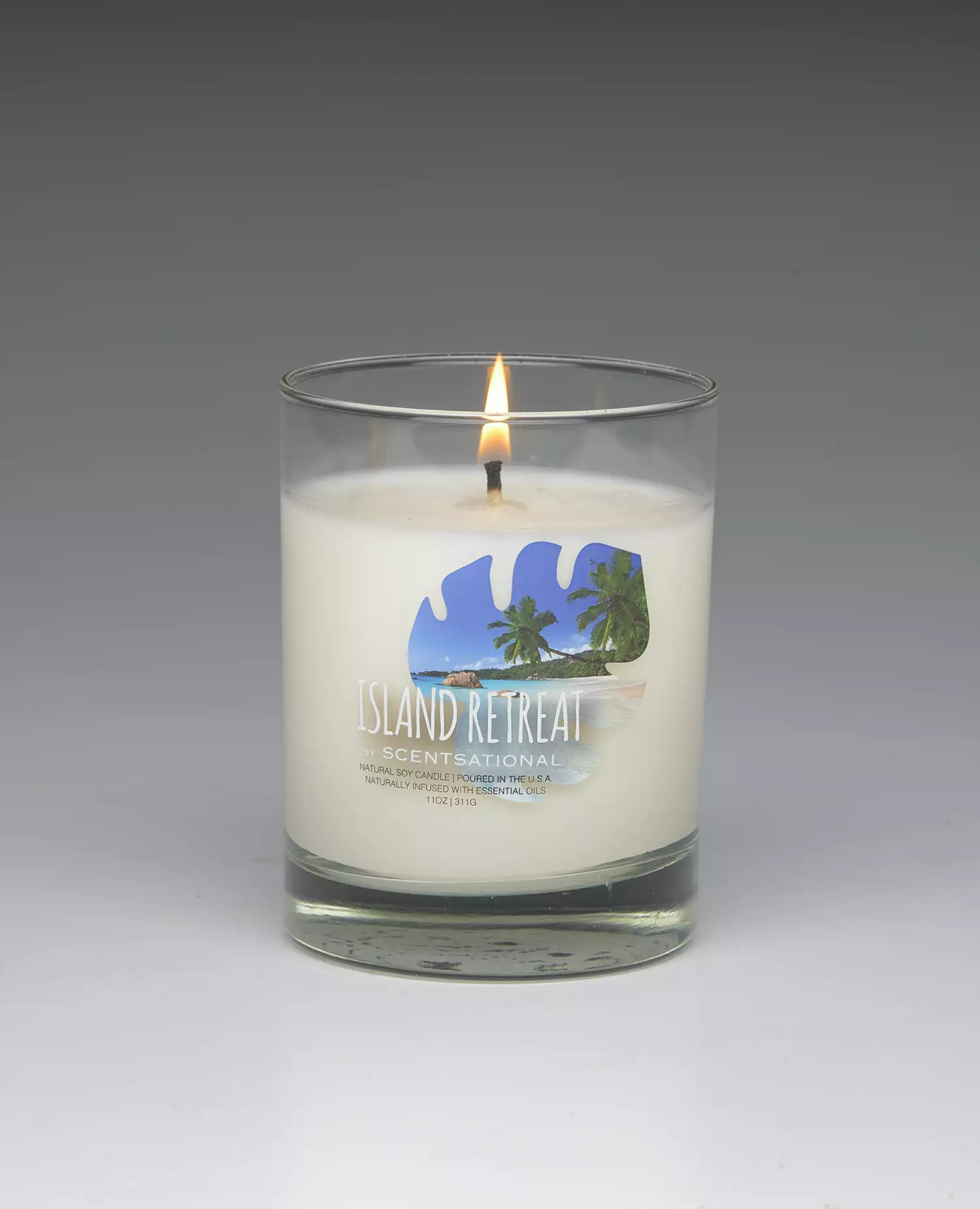 Island Retreat – 11oz scented candle burning