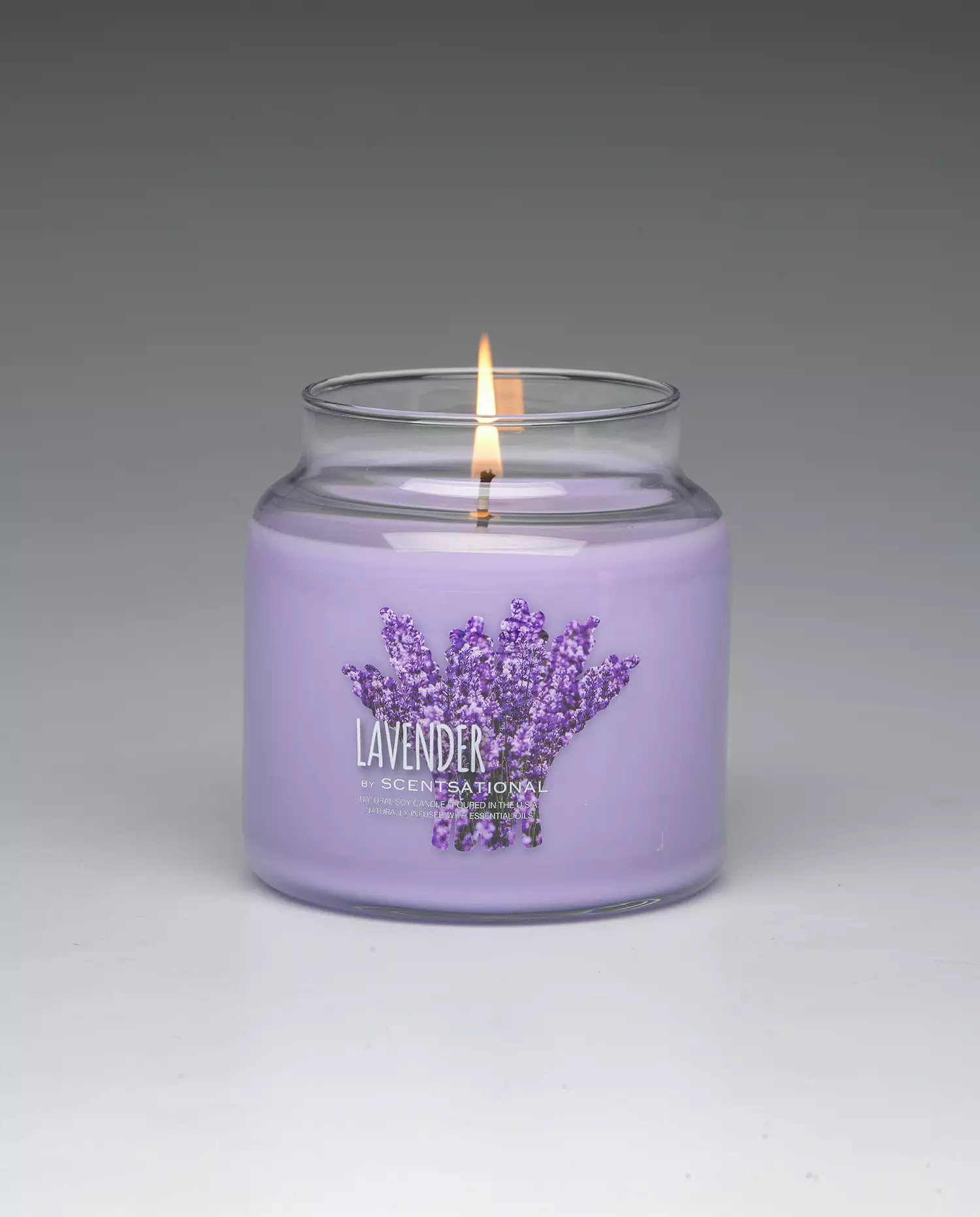 Lavender 11oz scented candle burning