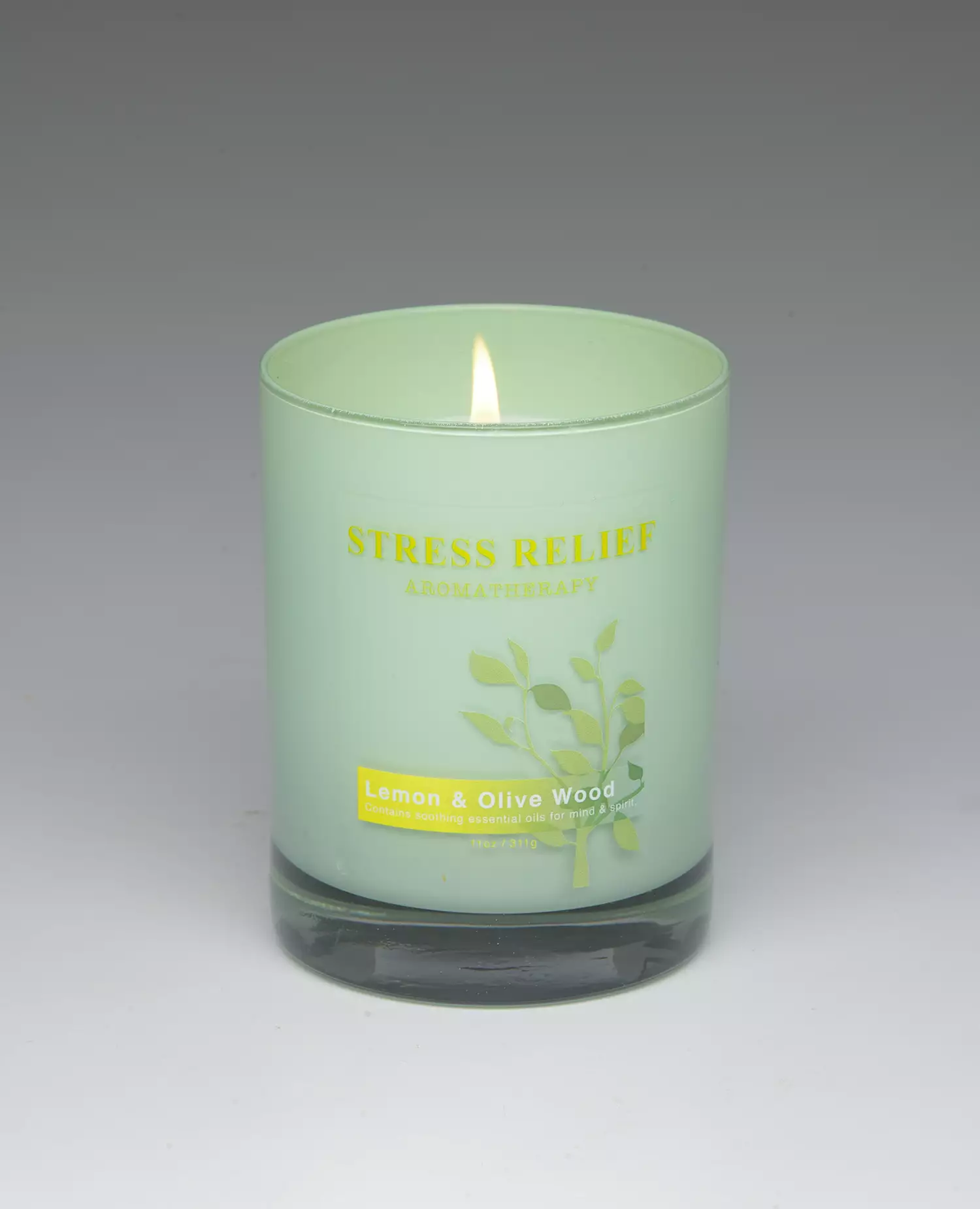 Lemon & Olivewood – 11oz scented candle burning