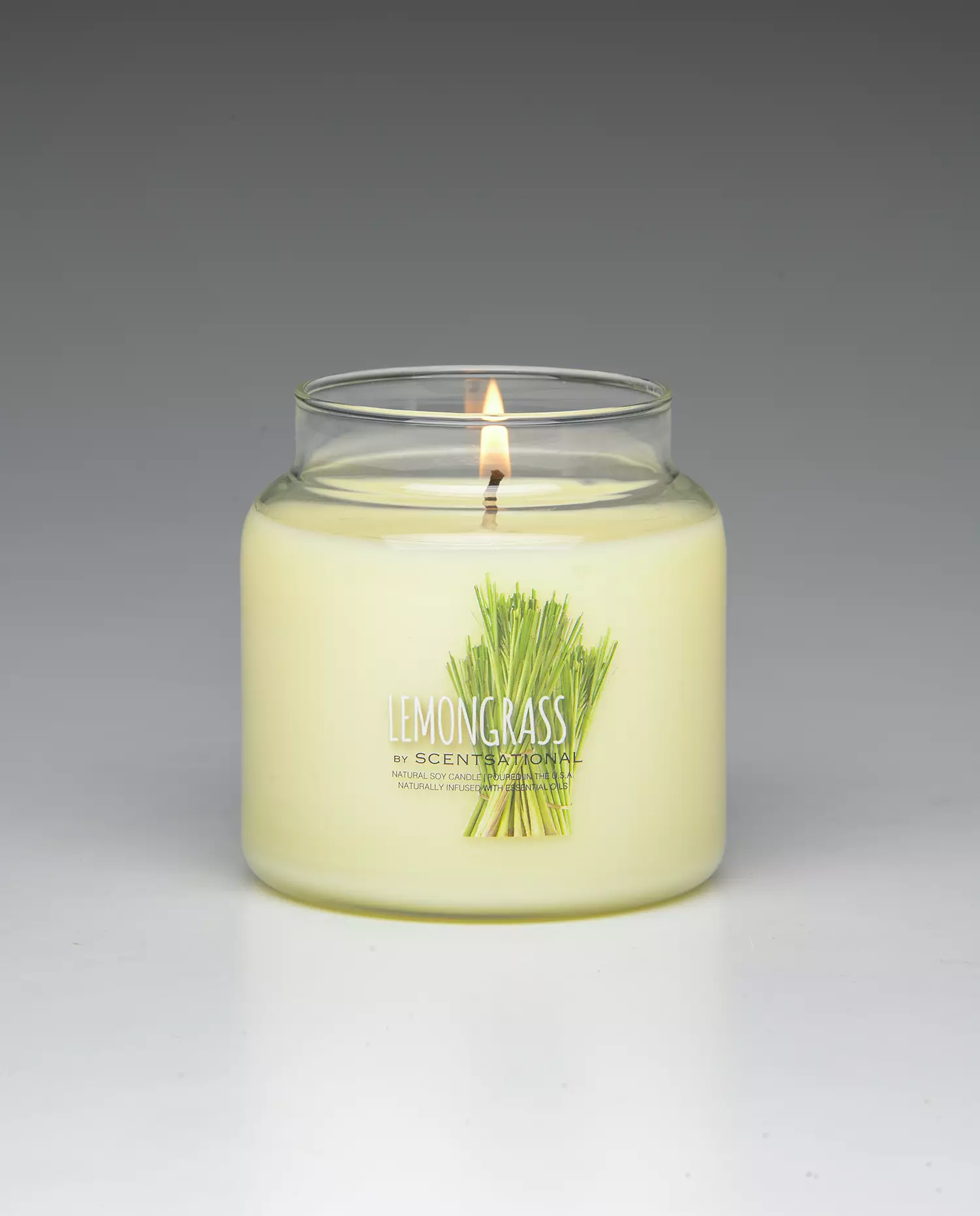 Lemongrass 19oz scented candle burning