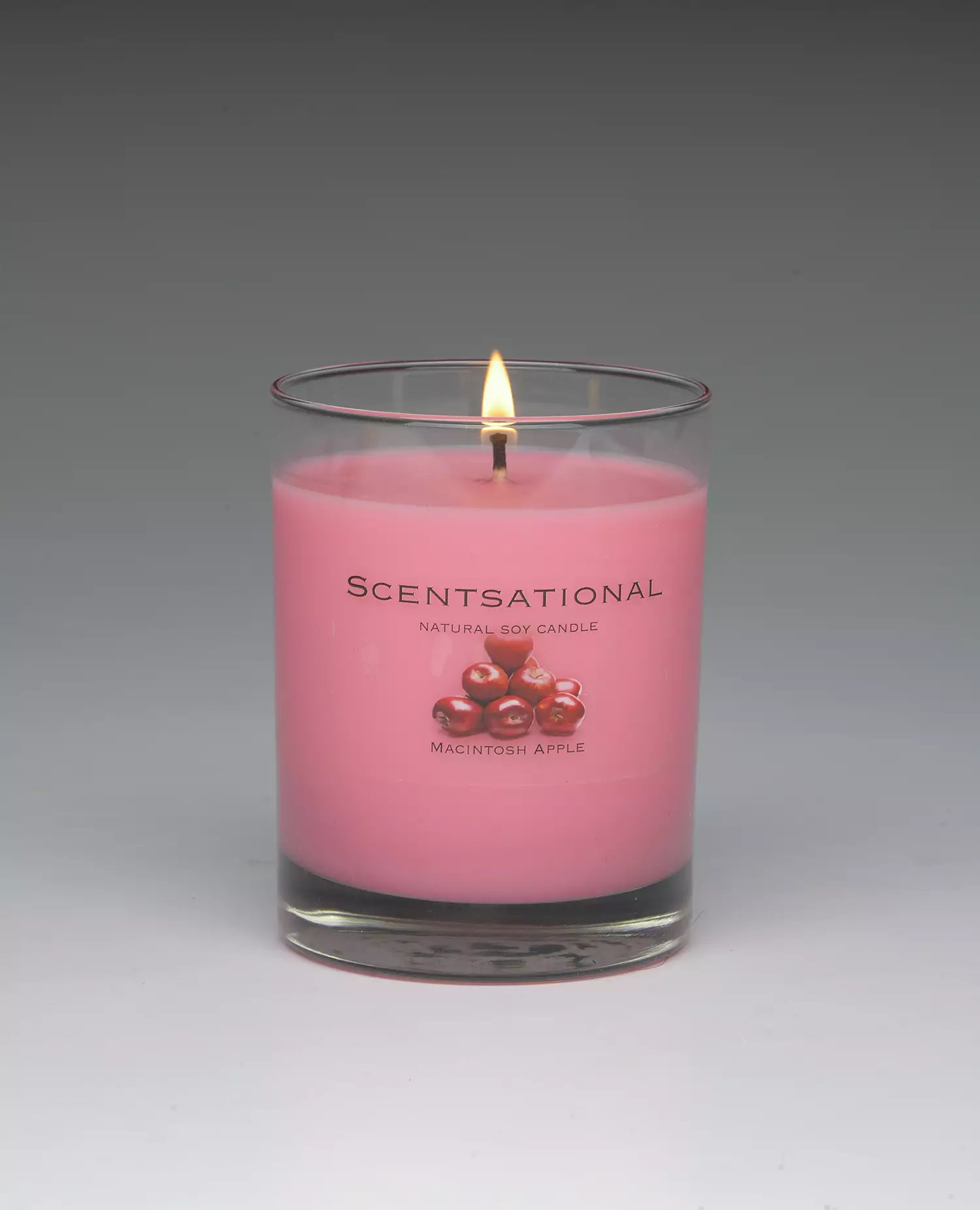 McIntosh Apple – 11oz scented candle burning
