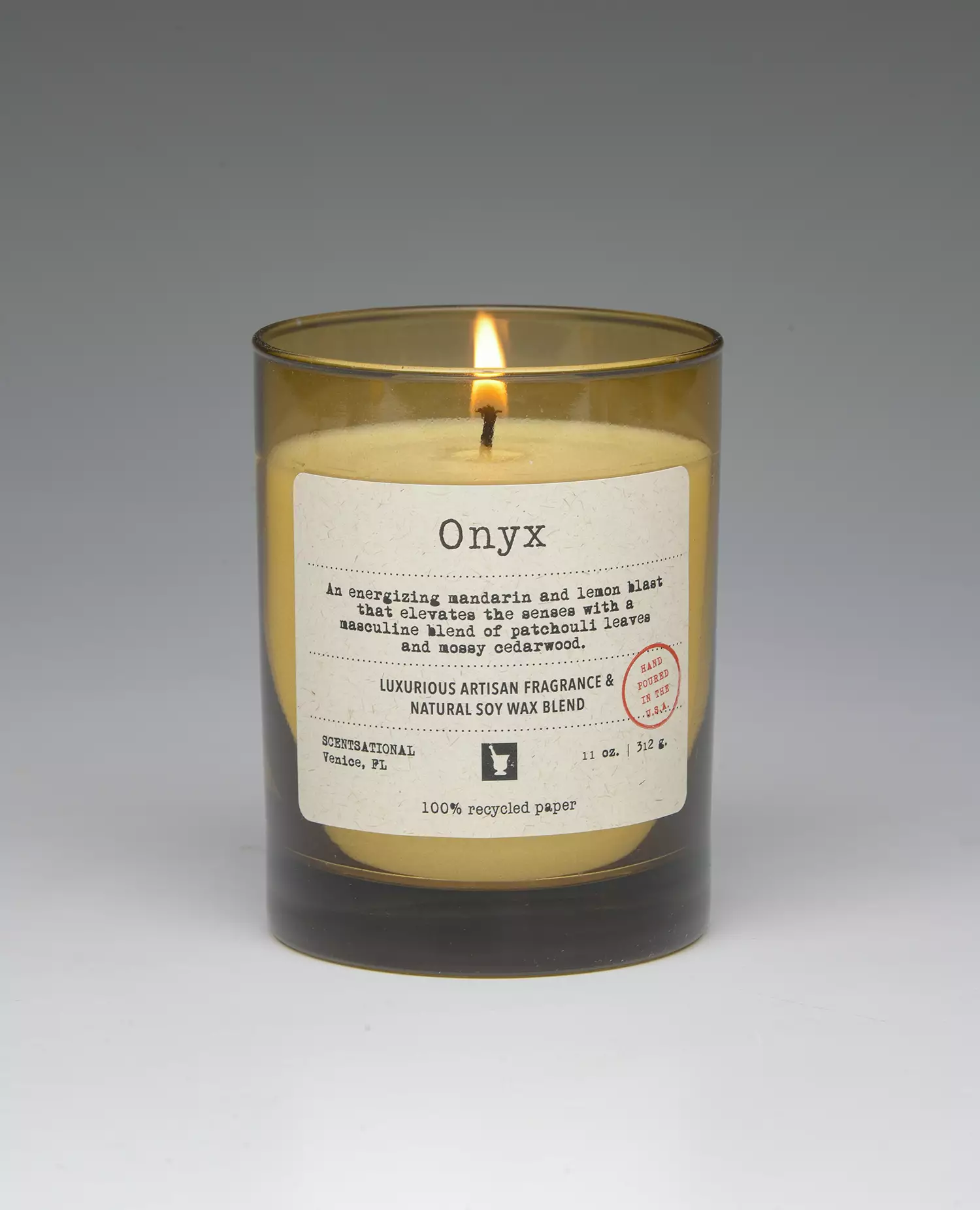 Onyx – 11oz scented candle burning