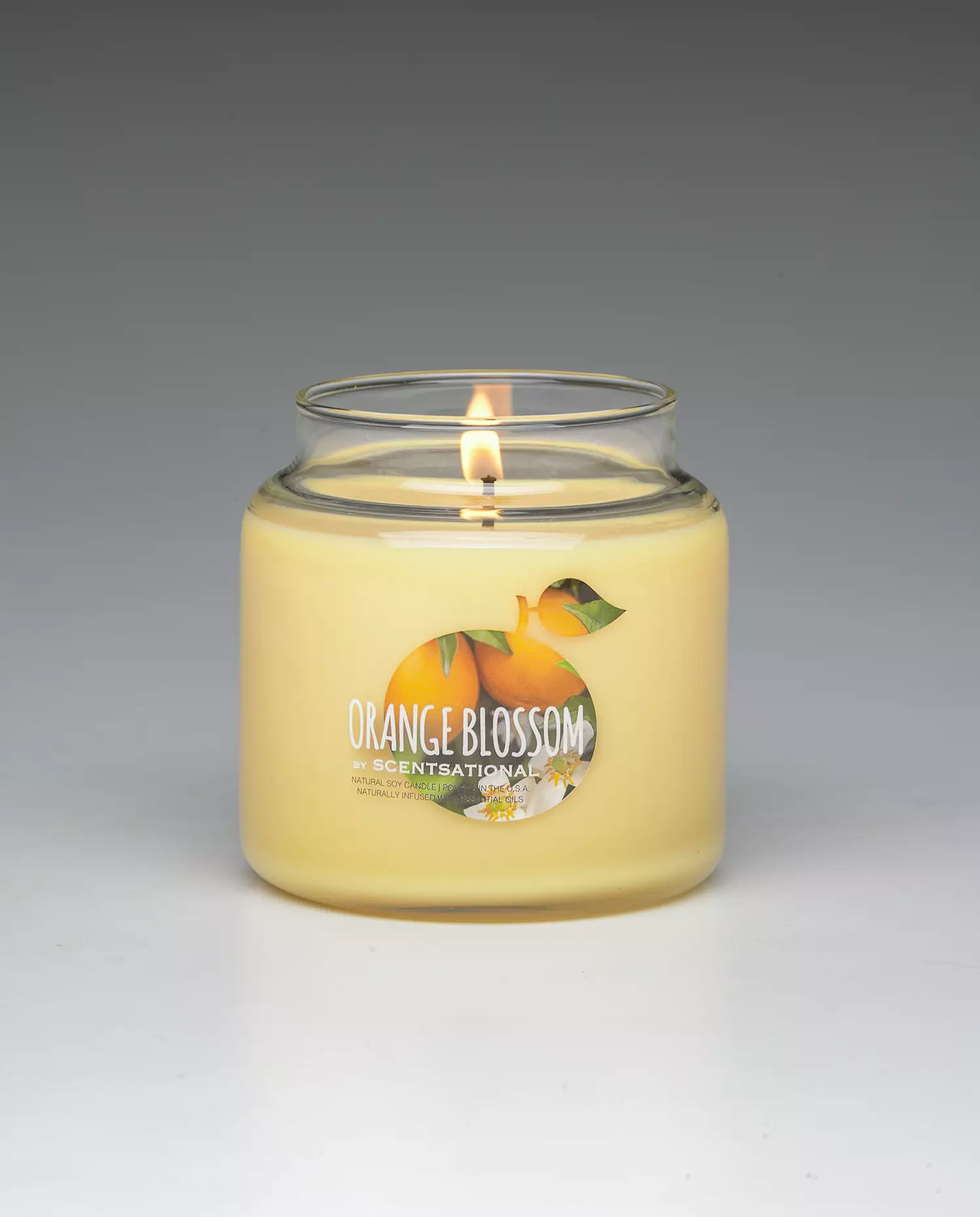 Orange Blossom 19oz scented candle burning