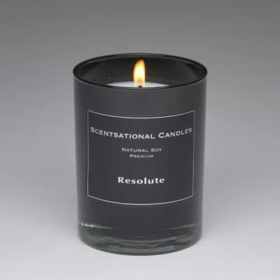 Resolute – 11oz scented candle burning