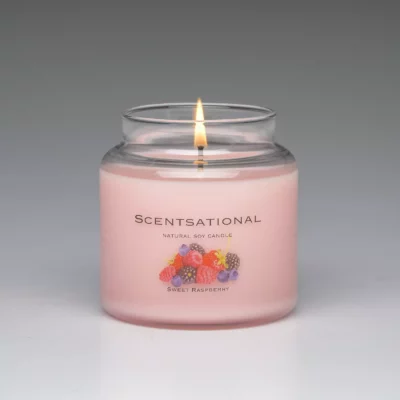 Sweet Raspberry 19oz Scented Candle burning
