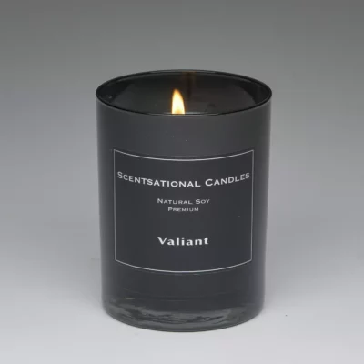 Valiant – 11oz scented candle burning
