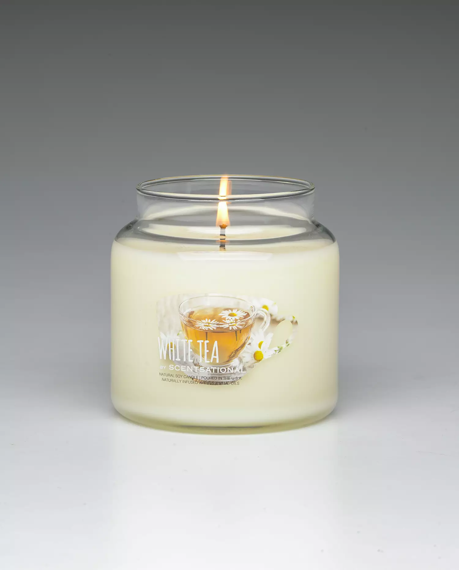 White Tea 19oz Scented Candle burning